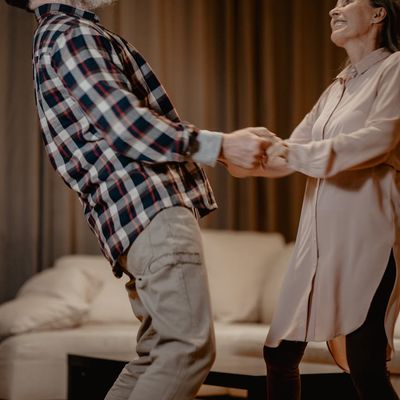 Portrait of Olga Zariczna, the yoga guide, smiling warmly.